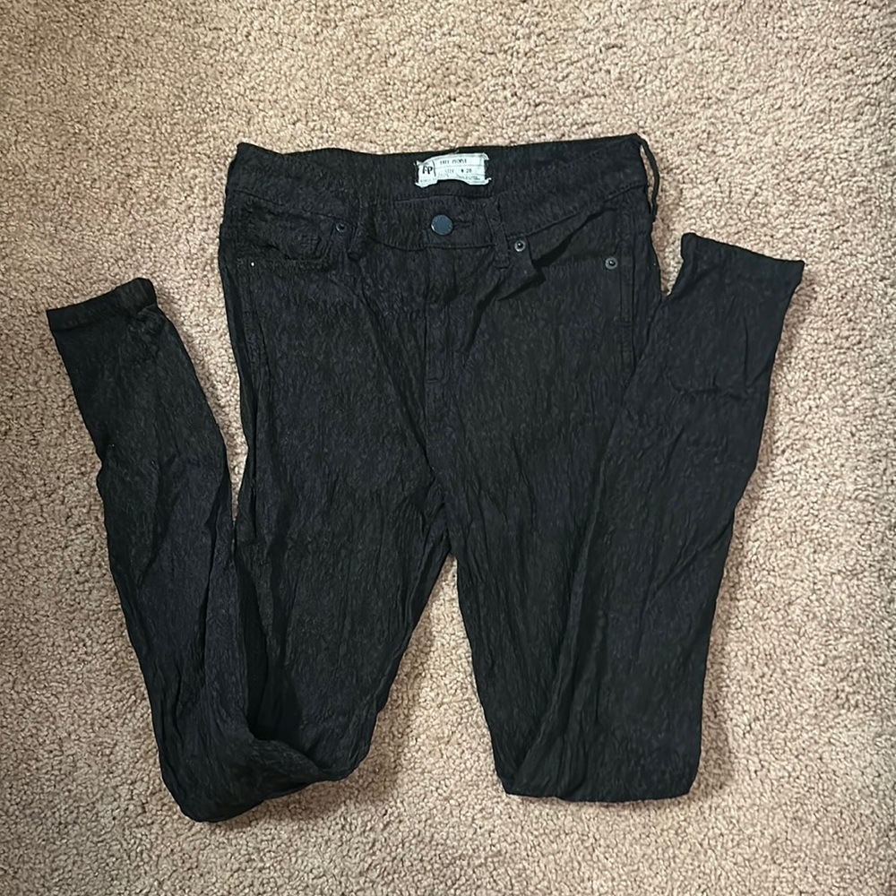 Free people, size 26 black textured skinny jeans.